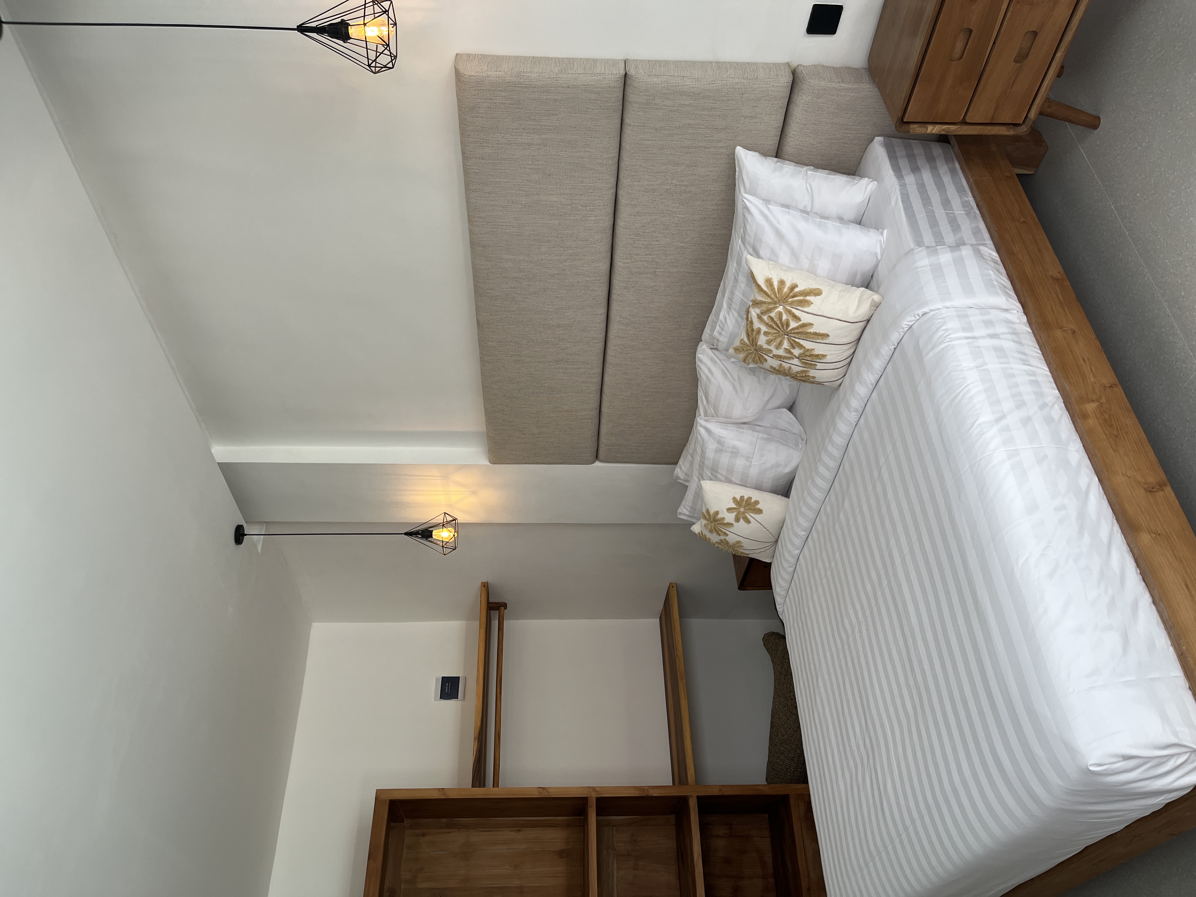 Bed in one of the rooms at Gahana Co Living