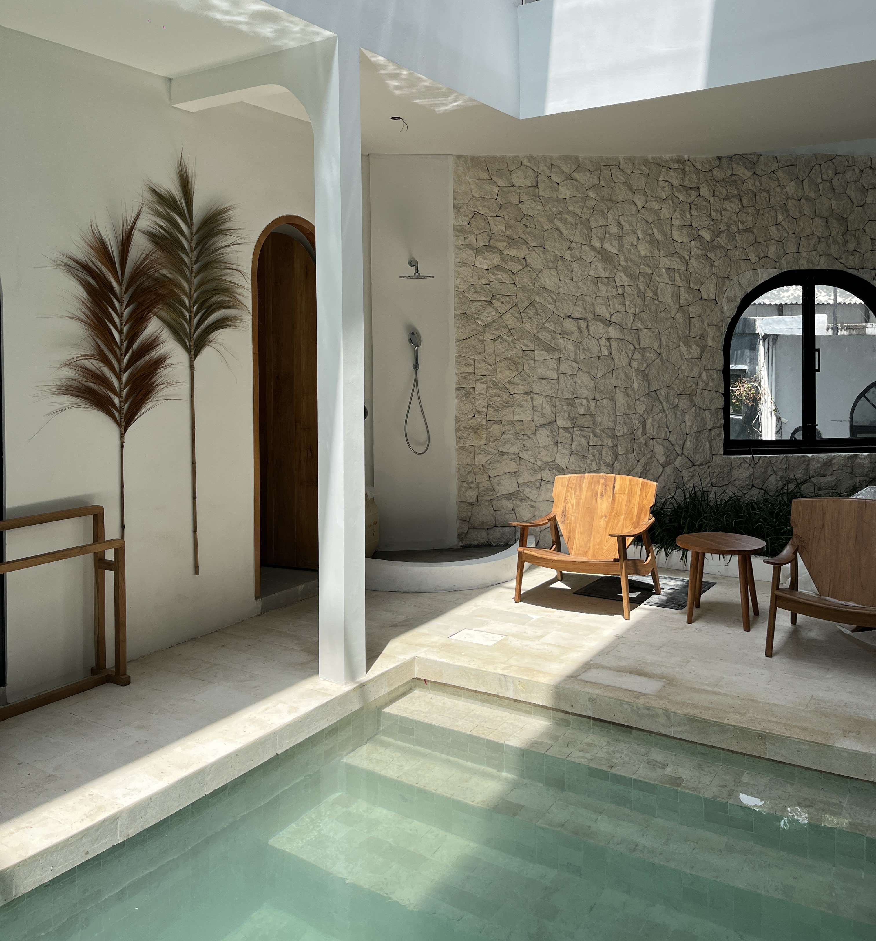Swimming pool and lounge area at Gahana Co Living