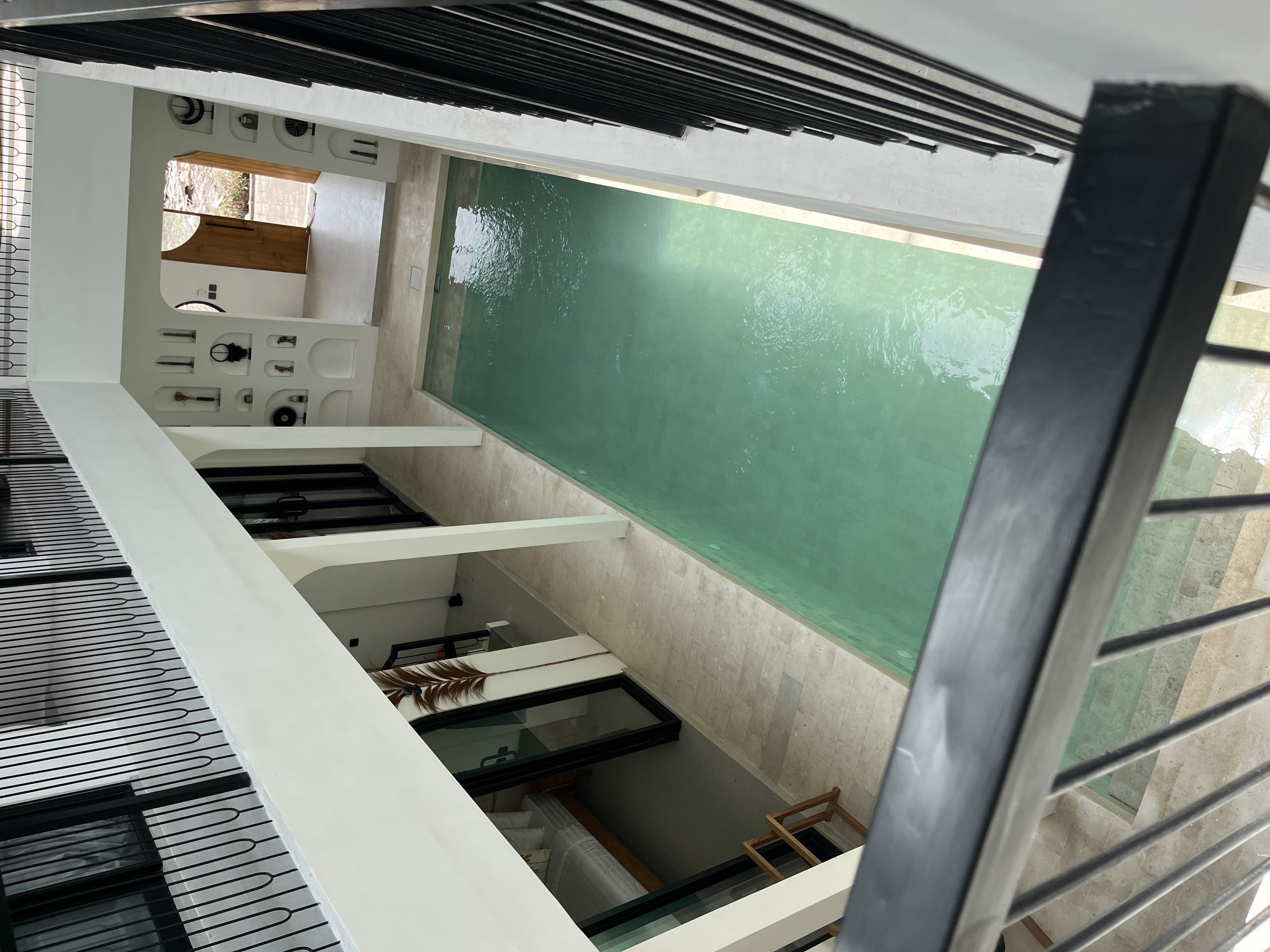View of the swimming pool from the upper floor at Gahana Co Living